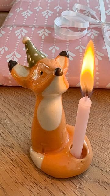Fuchs als Kerzenhalter